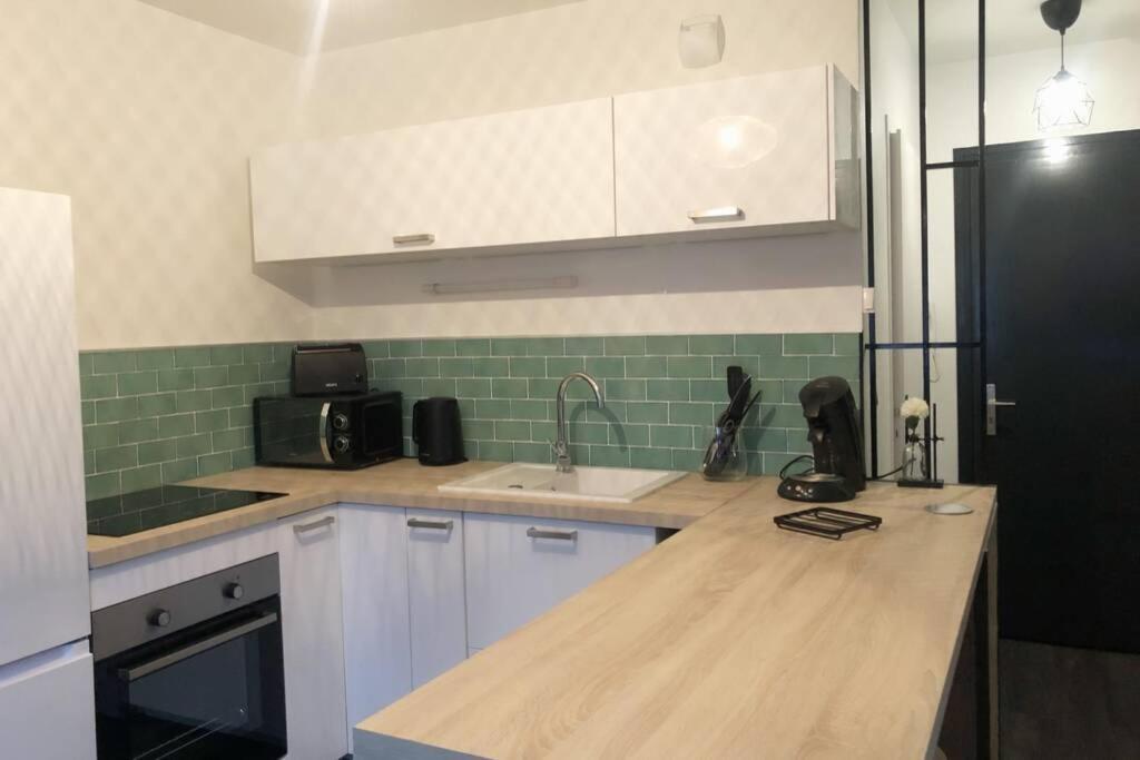 Appartement Cosy Proche De La Gare แซ็ง-ฌ็อง-เดอ-โมเรียน ภายนอก รูปภาพ